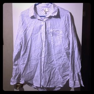 White and blue button down blouse.